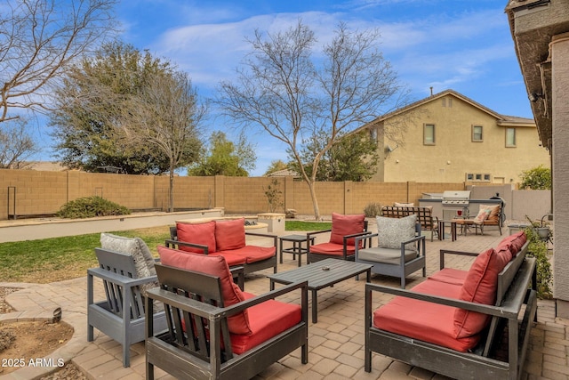 view of patio / terrace with grilling area and outdoor lounge area