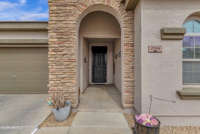 property entrance featuring a garage