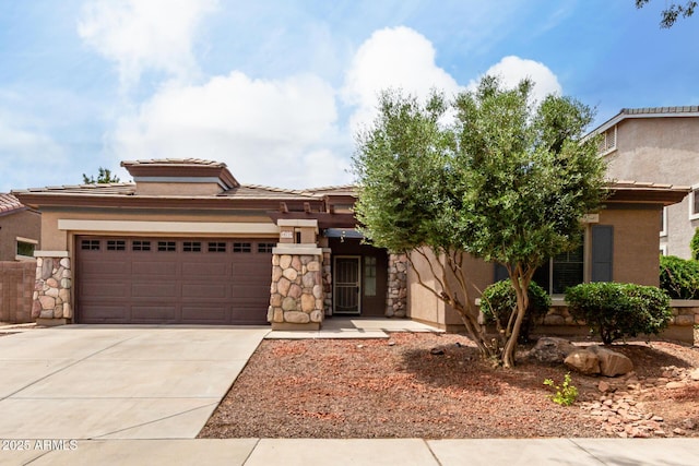 18719 E Pelican Ct, Queen Creek, AZ 85142 - view of front of home with stone siding, a tiled roof, an attached garage, driveway, and stucco siding
