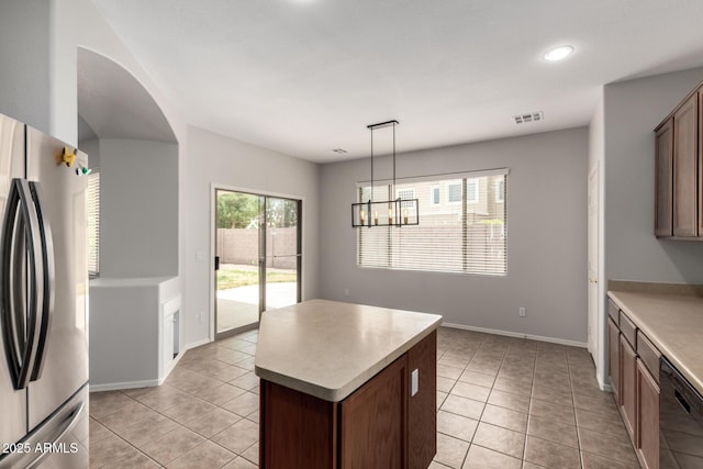 18719 E Pelican Ct, Queen Creek, AZ 85142 - kitchen featuring freestanding refrigerator, dishwasher, light tile patterned flooring, light countertops, and recessed lighting