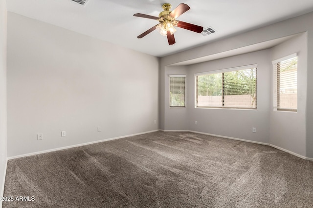 18719 E Pelican Ct, Queen Creek, AZ 85142 - unfurnished room featuring carpet, ceiling fan, and baseboards