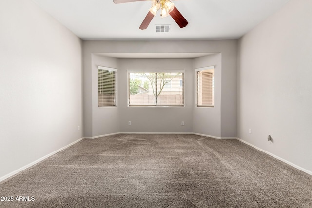 18719 E Pelican Ct, Queen Creek, AZ 85142 - carpeted spare room with a ceiling fan and baseboards