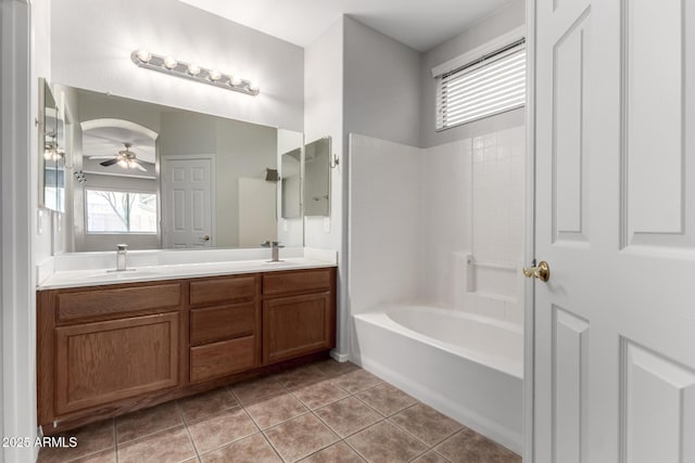 18719 E Pelican Ct, Queen Creek, AZ 85142 - bathroom featuring double vanity, a ceiling fan, tile patterned floors, and shower / tub combination