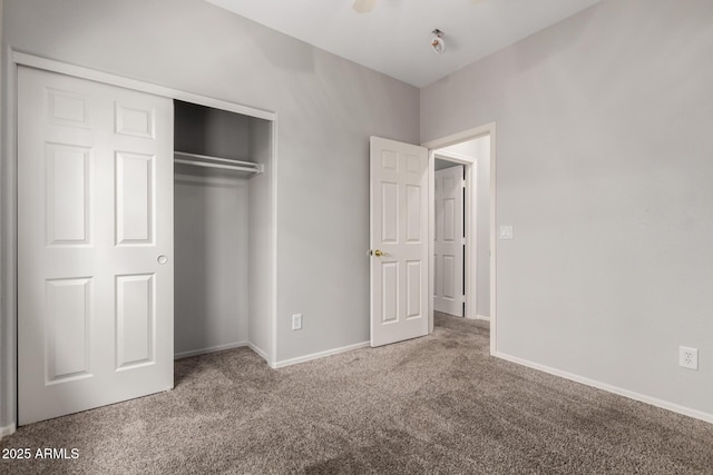 18719 E Pelican Ct, Queen Creek, AZ 85142 - unfurnished bedroom featuring carpet floors, a closet, and baseboards