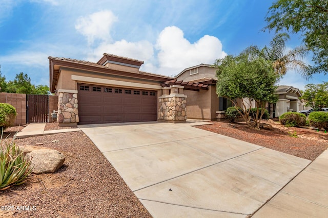 18719 E Pelican Ct, Queen Creek, AZ 85142 - view of front facade with a gate, stucco siding, concrete driveway, an attached garage, and a tiled roof