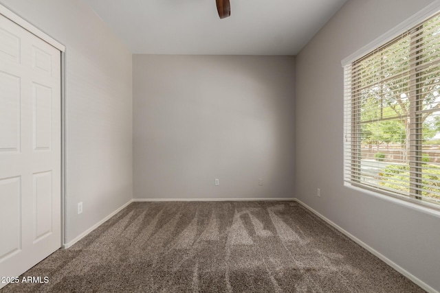 18719 E Pelican Ct, Queen Creek, AZ 85142 - carpeted empty room with healthy amount of natural light, baseboards, and ceiling fan