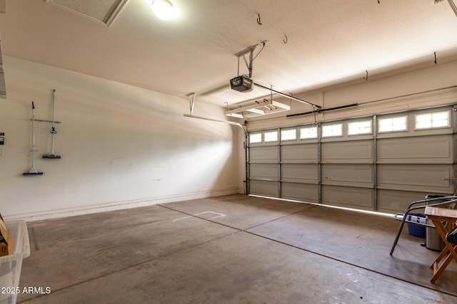 18719 E Pelican Ct, Queen Creek, AZ 85142 - garage with a garage door opener and baseboards