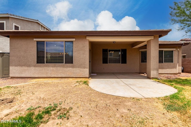 18719 E Pelican Ct, Queen Creek, AZ 85142 - back of house featuring a patio area and stucco siding