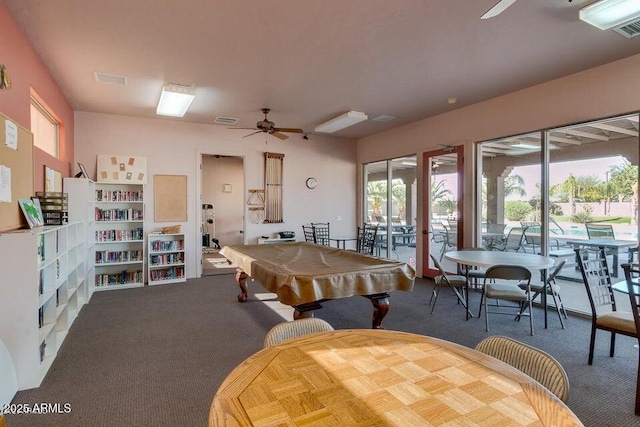 playroom with a healthy amount of sunlight, pool table, a ceiling fan, and carpet