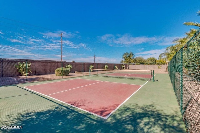 view of sport court with community basketball court and fence