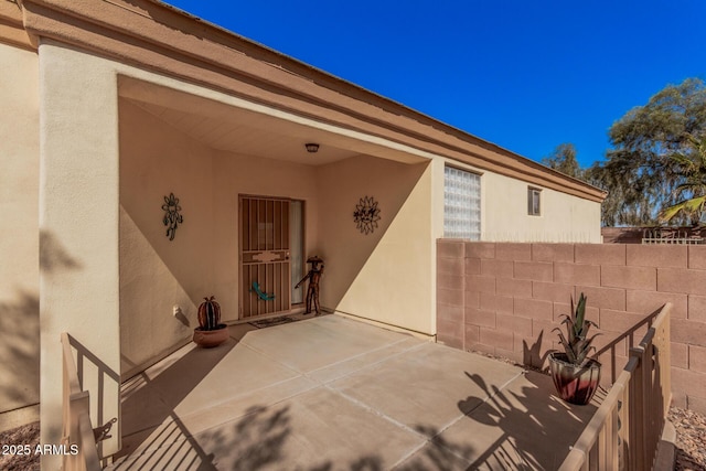 view of patio / terrace with fence