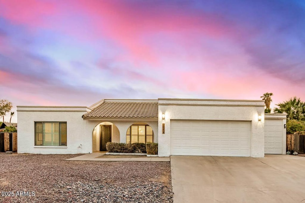 view of front of home featuring a garage