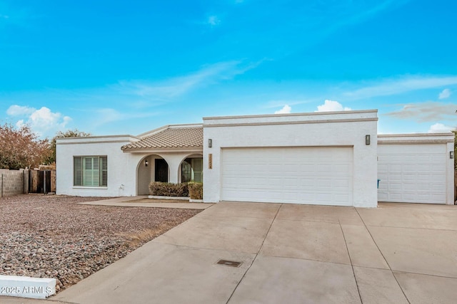 view of front of property featuring a garage