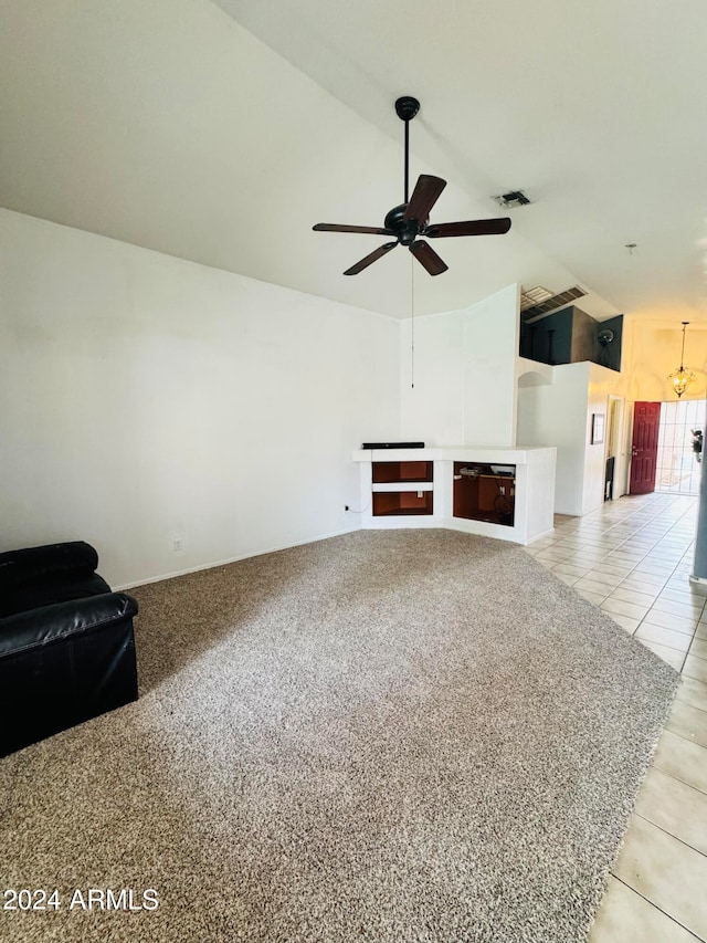 living room with tile patterned flooring and ceiling fan