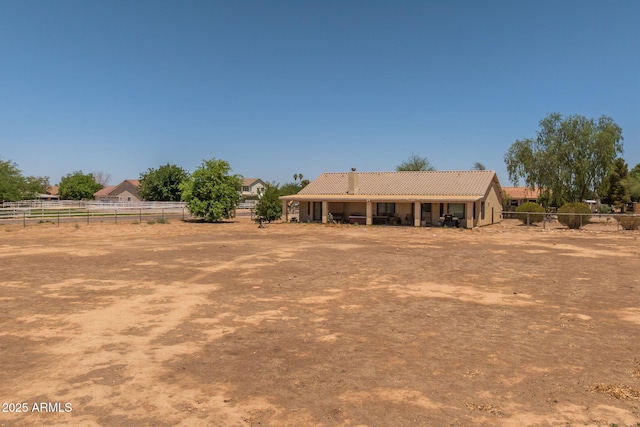 22201 E Vallejo St, Queen Creek, AZ 85142 - rear view of house with a tile roof and stucco siding