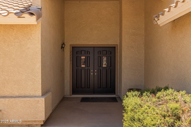 22201 E Vallejo St, Queen Creek, AZ 85142 - doorway to property featuring stucco siding