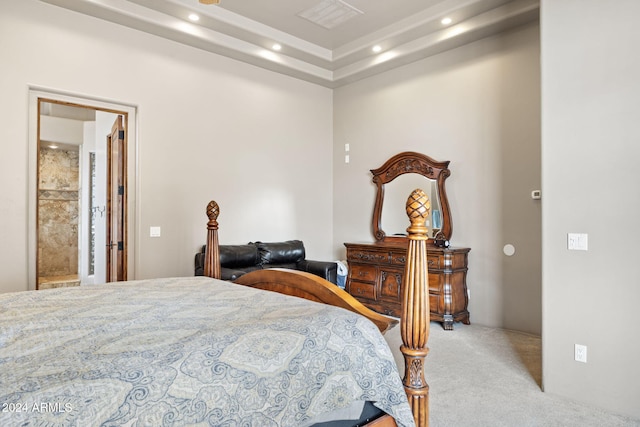 carpeted bedroom with ensuite bathroom