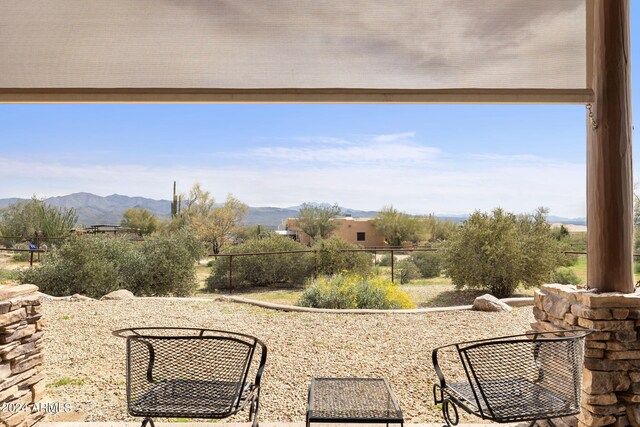 view of patio featuring a mountain view