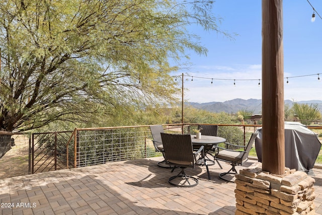 view of patio with a mountain view