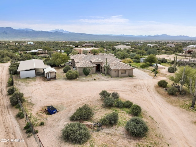 drone / aerial view featuring a mountain view