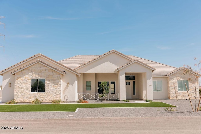 1229 N 106th Pl, Mesa, AZ 85207 - view of front of property with a tiled roof, stone siding, and stucco siding