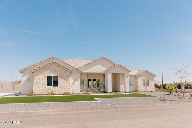 1229 N 106th Pl, Mesa, AZ 85207 - view of front of property with stone siding, a tiled roof, and stucco siding