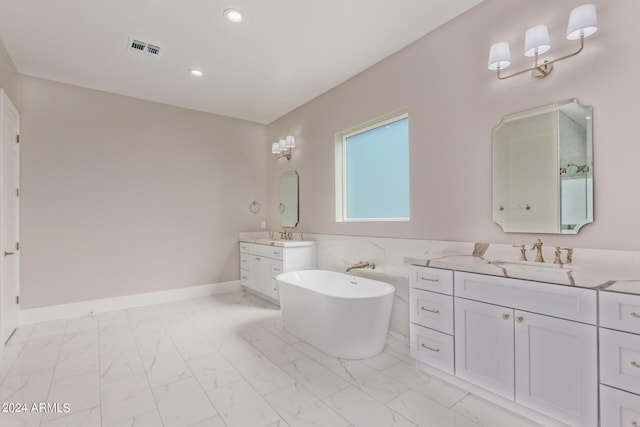 1229 N 106th Pl, Mesa, AZ 85207 - full bathroom with marble finish floors, a freestanding tub, recessed lighting, and two vanities