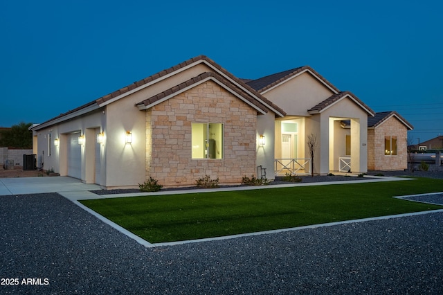 1229 N 106th Pl, Mesa, AZ 85207 - ranch-style house featuring central AC, stone siding, a tiled roof, a garage, and a front yard
