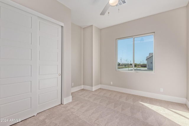 1229 N 106th Pl, Mesa, AZ 85207 - unfurnished bedroom with carpet floors, baseboards, a ceiling fan, and a closet