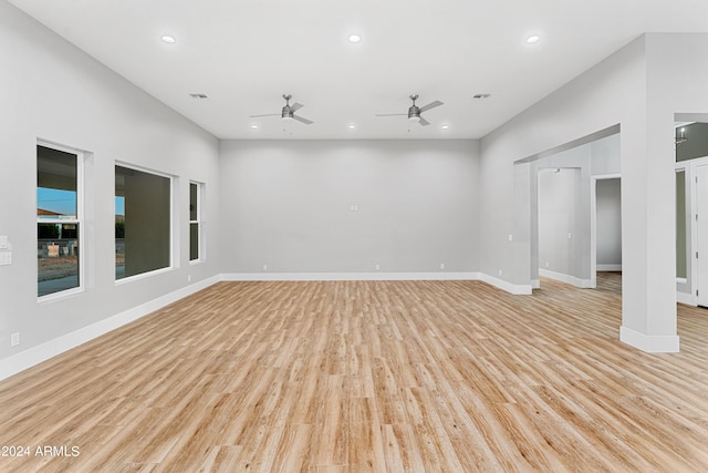 1229 N 106th Pl, Mesa, AZ 85207 - unfurnished living room with a ceiling fan, light wood-style flooring, baseboards, and recessed lighting