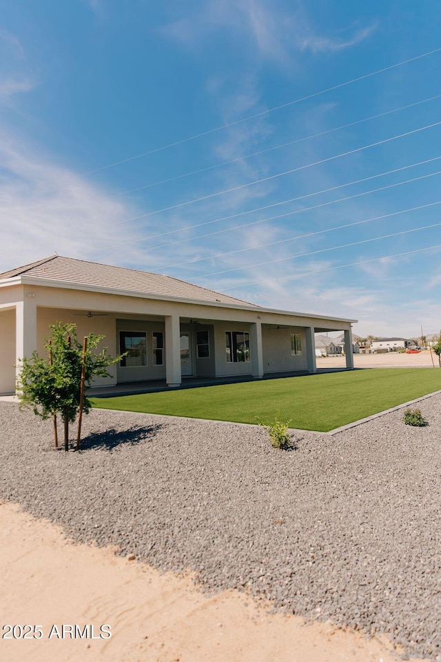 1229 N 106th Pl, Mesa, AZ 85207 - ranch-style home featuring a front yard and stucco siding