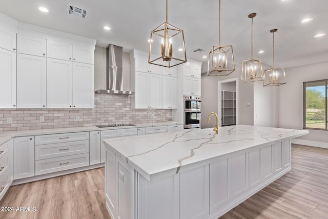 1229 N 106th Pl, Mesa, AZ 85207 - kitchen with wall chimney range hood, a chandelier, double oven, black electric stovetop, and backsplash