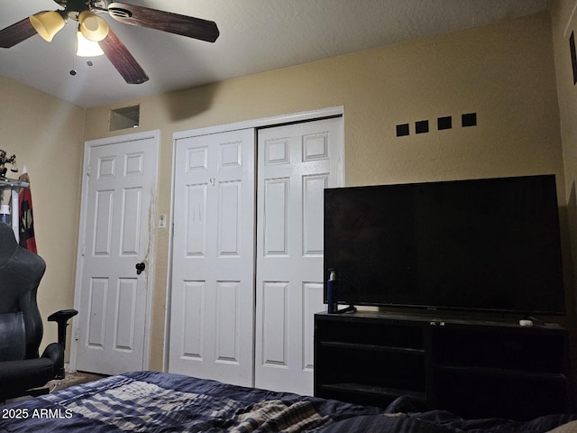 bedroom featuring a closet and ceiling fan