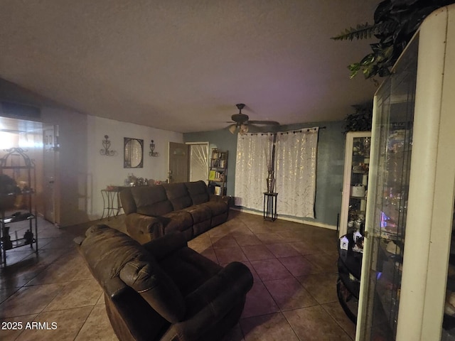 living room with tile patterned floors and ceiling fan
