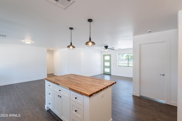 2818 E Villa Rita Dr, Phoenix, AZ 85032 - kitchen featuring wood counters, open floor plan, ceiling fan, white cabinets, and dark wood-type flooring