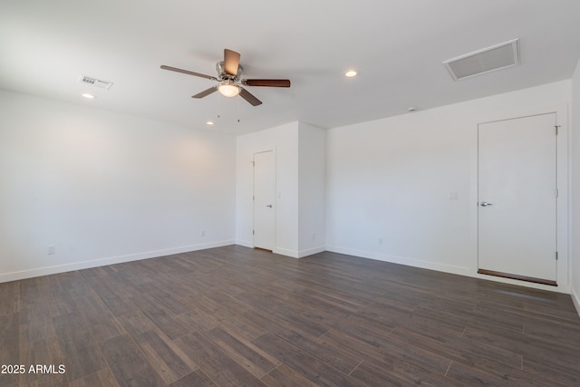 2818 E Villa Rita Dr, Phoenix, AZ 85032 - empty room with a ceiling fan, dark wood-style floors, recessed lighting, and baseboards