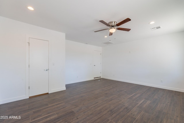 2818 E Villa Rita Dr, Phoenix, AZ 85032 - spare room featuring a ceiling fan, dark wood-style floors, baseboards, and recessed lighting