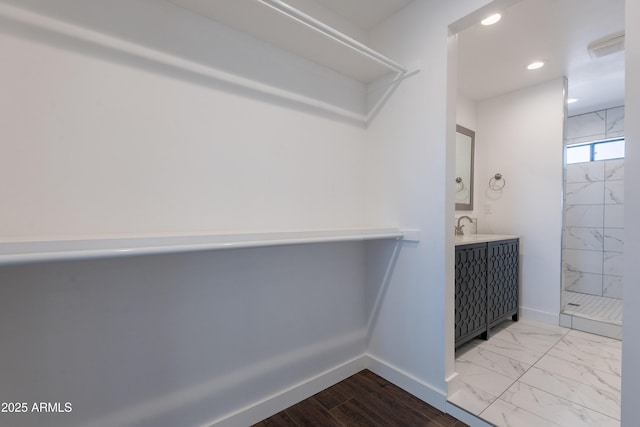 2818 E Villa Rita Dr, Phoenix, AZ 85032 - spacious closet with marble finish floors and a sink