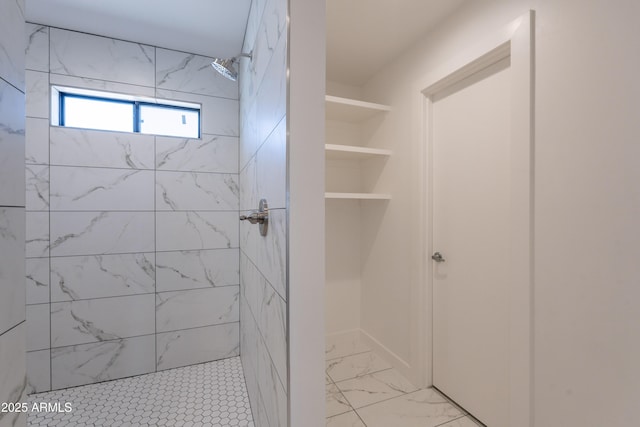 2818 E Villa Rita Dr, Phoenix, AZ 85032 - bathroom featuring a tile shower and marble look tile flooring