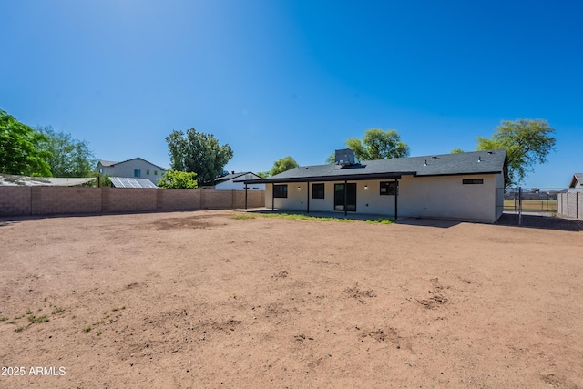 2818 E Villa Rita Dr, Phoenix, AZ 85032 - rear view of house with a fenced backyard and a patio area
