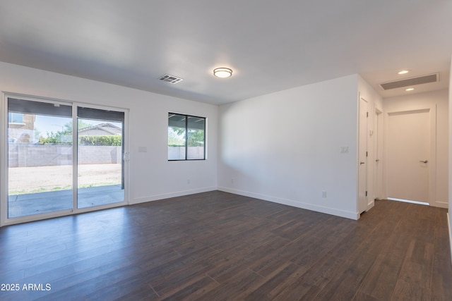 2818 E Villa Rita Dr, Phoenix, AZ 85032 - spare room with dark wood-style flooring, baseboards, and recessed lighting