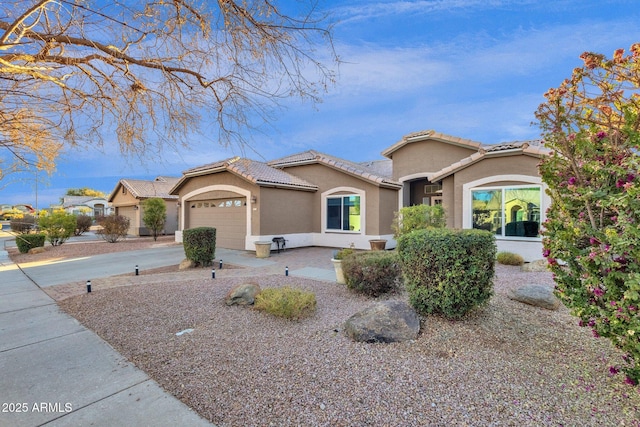 view of front of property with a garage