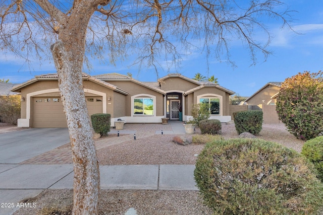 view of front of home with a garage