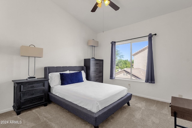 bedroom with a ceiling fan, carpet flooring, lofted ceiling, and baseboards