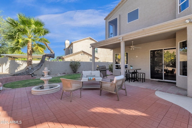 view of patio / terrace with ceiling fan and a fenced backyard