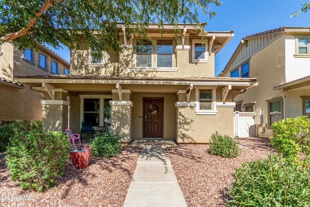 942 S Deerfield Ln, Gilbert, AZ 85296 - view of front facade featuring covered porch and stucco siding