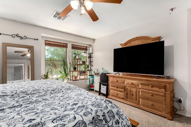 942 S Deerfield Ln, Gilbert, AZ 85296 - bedroom with light colored carpet and ceiling fan