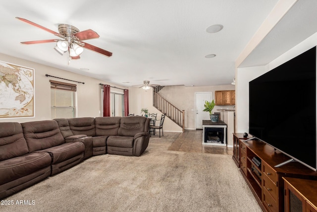 942 S Deerfield Ln, Gilbert, AZ 85296 - carpeted living room with ceiling fan and stairs