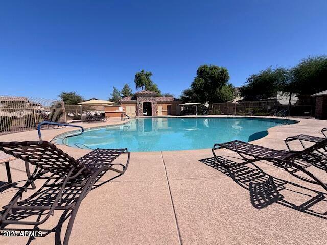 942 S Deerfield Ln, Gilbert, AZ 85296 - community pool featuring a patio area
