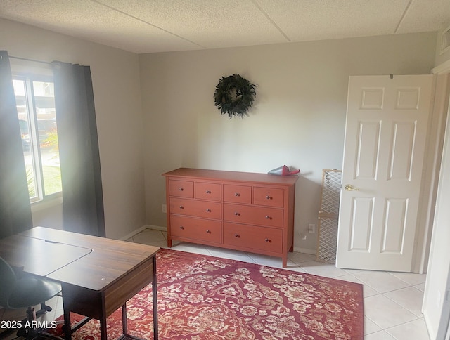 4201 E Camelback Rd Unit 51, Phoenix, AZ 85018 - bedroom featuring light tile patterned floors and multiple windows